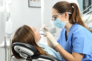 Patient receiving teeth cleaning