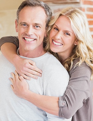 Man and woman with flawless smiles