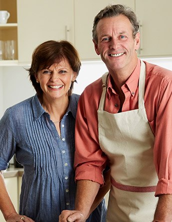 Smiling older man and woman